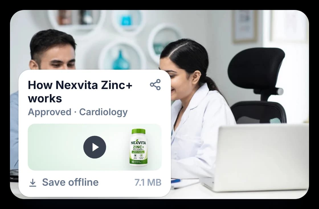 Medical rep detailing a doctor on a tablet, with the approved product video card the rep is showing