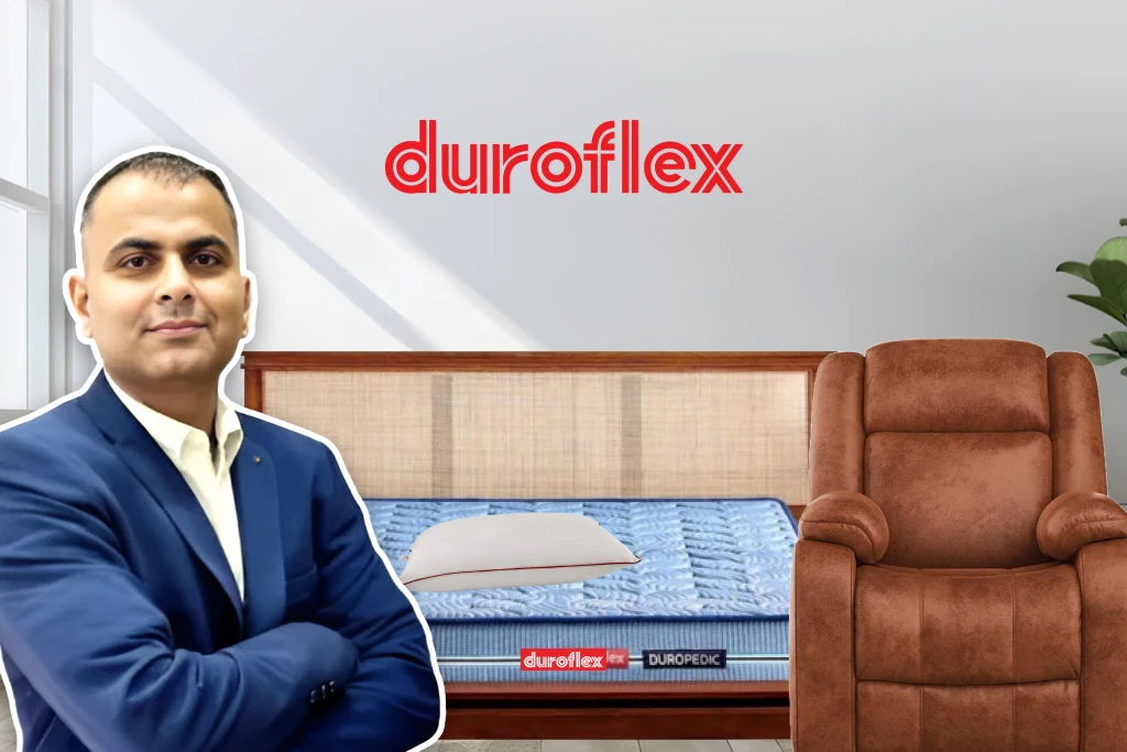 Anup Daware, CIO of Duroflex, stands in front of a Duropedic mattress and recliner, with the Duroflex logo displayed, highlighting the brand’s commitment to comfort, innovation, and its transformation through SFA software.