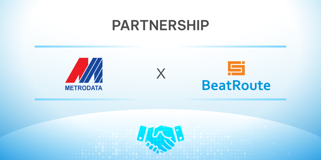 Banner pengumuman kemitraan antara BeatRoute dan PT Metrodata Electronics. Logo Metrodata berada di kiri, logo BeatRoute di kanan, dengan tulisan “Partnership” di bagian atas dan ikon jabat tangan digital di bagian bawah.