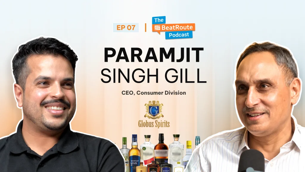 The BeatRoute Podcast Episode 07 featuring Paramjit Singh Gill, CEO – Consumer Division at Globus Spirits, in a conversation setup with host and brand liquor bottles displayed.
